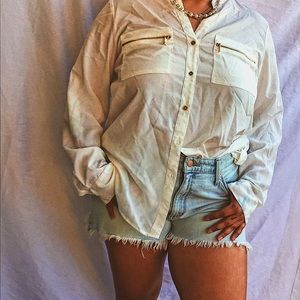 Light wash denim distressed shorts.